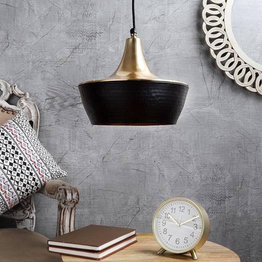 The "Vega Hanging light" by Décor de Maison in Gold & Black finish